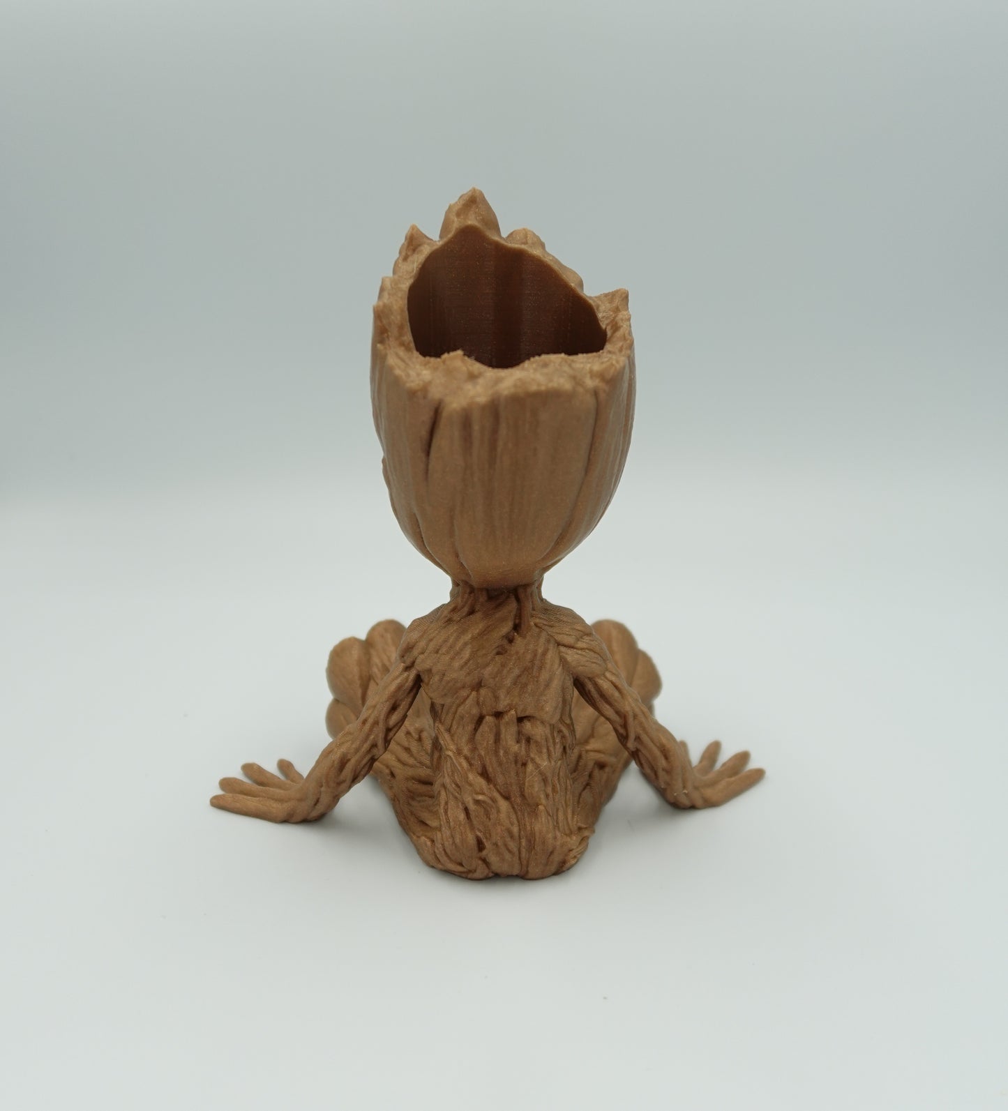 Groot assis